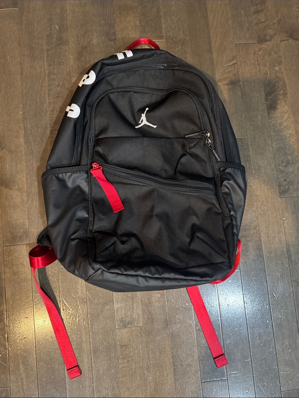 Nike Jordan Black Backpack with Red Accents and Jumpman Logo